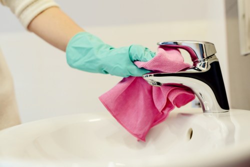 Daily cleaning tasks in a Soho office kitchen and communal area