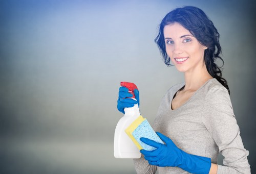 Professional cleaner working in a mixed-use Soho property near the West End